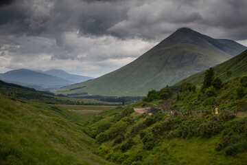 Fototapeta premium West Highland Way in Beinn Dorian, Scotland. Railroad in the Highlands
