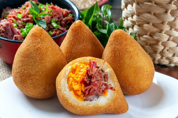 Brasilian snack coxinha, dried meat with cheddar
