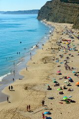 Europe, Portugal, Faro district, Algarve, Lagos, Porto de Mos beach, Luz in background, Southwest Coast of Portugal is on tentative list of UNESCO natural heritage site