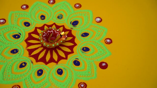 Yellow color background design for Diwali festival with beautiful lamps. Decorative colorful lamps during Diwali festival.