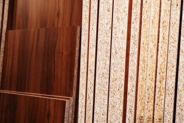 Veneered chipboard in a furniture production warehouse. Close-up