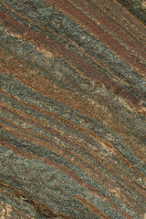 The texture of an iron ore mineral rock, a type of iron ore with impurities. The texture of a natural stone.