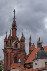 St. Anne's Church in Vilnius, with hevy cloudy sky on the background.