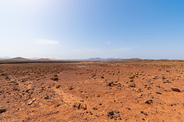Desert landscape with mountains terraine. Caldera of an ancient volcano.
