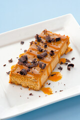 Dessert Dulce De Leche Cheesecake served in a dish isolated on background side view of fastfood