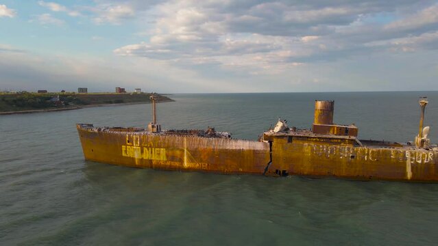 Drone footage of a rusty shipwreck at the Black Sea located next to Costinesti beach, in Romania. Aerial video was shot from a drone while flying forward and getting in close proximity to the wreck.