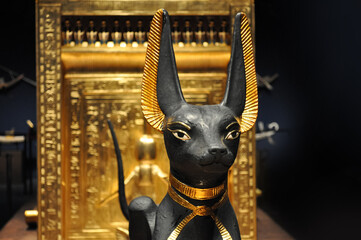 Anubis as a guard in front of a burial chamber of a pharaoh
