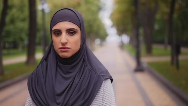 Portrait of unhappy Arab woman in hijab, muslim women rights, discrimination