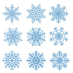 Fototapeta na wymiar set of blue snowflakes on white