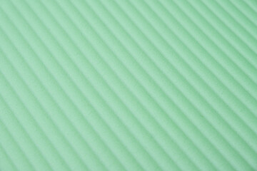 Green striped waved polyurethane foam background