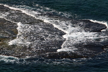 Fototapeta premium The color of the water in the mediterranean sea in shallow water