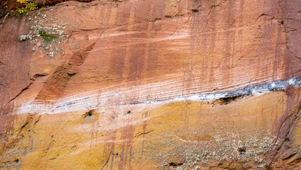 Sandy rock wall on the banks of the River Gauja. Gauja national park, Latvia