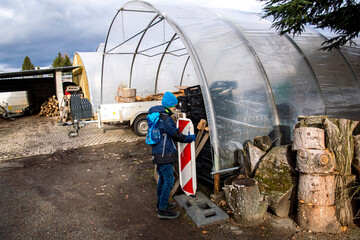 Old greenhouse with plastic film 