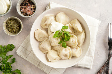 traditional ukrainian east european dish varenyky or chinese wan tan or dim sum - dumplings stuffed...