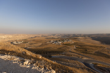 Mount Herodion and the ruins of the fortress of King Herod inside an artificial crater. The Judaean Desert, West Bank. High quality photo
