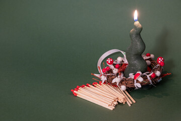 Burning candle with matches