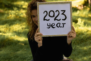 the year two thousand twenty-three HAPPY NEW YEAR 2024 - white paper plate with the inscription -...