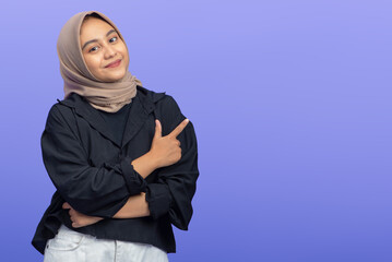 Asian Muslim Woman Pointing at Copy Space, Isolated