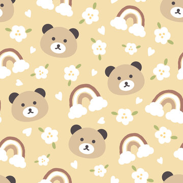 Cute teddy bear face with flowers and rainbows in the sky, kids baby pastel yellow seamless pattern background, print for wrapping paper, fabric and textile.