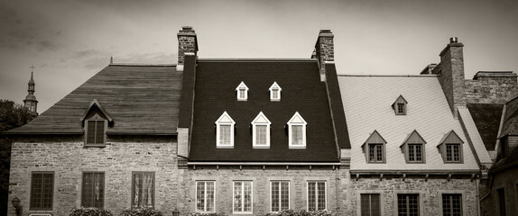 Three beautiful french Canadian houses in sepia