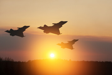 Air Force Day. Aircraft silhouettes on background of sunset or sunrise.