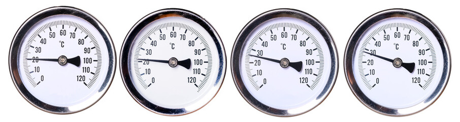 Round thermometer for measuring temperature with various readings and measurements.
