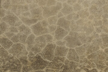 gray brown dirty stone background from old concrete wall with cracks