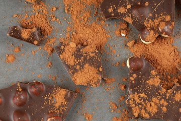 Chocolate with nuts and cocoa close-up