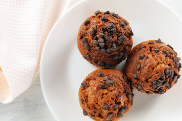 Muffins with chocolate in a white plate