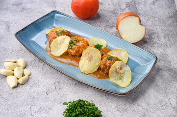 Appetizing meatballs with potato chips
