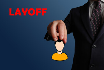 Layoff. Businessman holding an avatar of a person symbolizing dismissal or layoff of an employee.