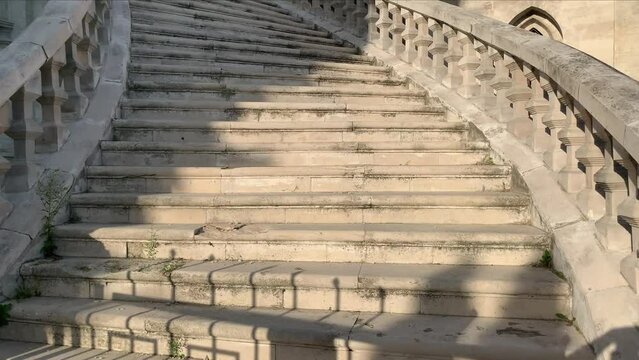 Staircase of a building. Wide stone concrete staircase