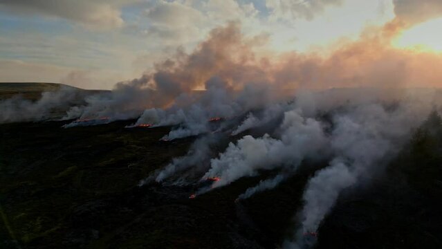 Heather burning on moorland above Holmfirth in West Yorkshire, long history of use in managing moorland. 