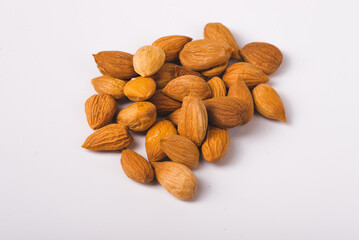 Some shelled Apricot Kernels as detailed close up shot (selective focus)