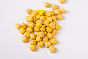 Roasted,yellow chickpeas background,top view,flat layout