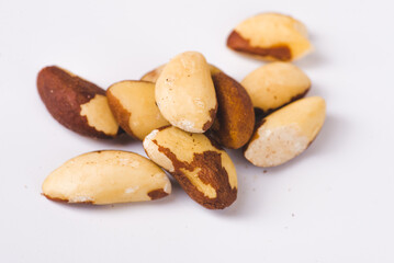 Many delicious Brazil nuts as background, top view