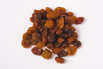Black, yellow and brown raisins isolated on white background. Top view. Flat lay. Set or collection