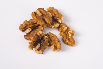 Walnut half isolate. Peeled walnut on white. Walnut nut top view. Set with clipping path. Full depth of field.