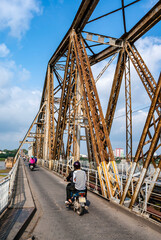 Fototapeta na wymiar Old iron Long Bien Bridge (former Paul Doumer Bridge) across the Red River in Hanoi, Vietnam, Asia