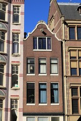 Amsterdam Nieuwezijds Voorburgwal Street Historic Brick House Facade, Netherlands