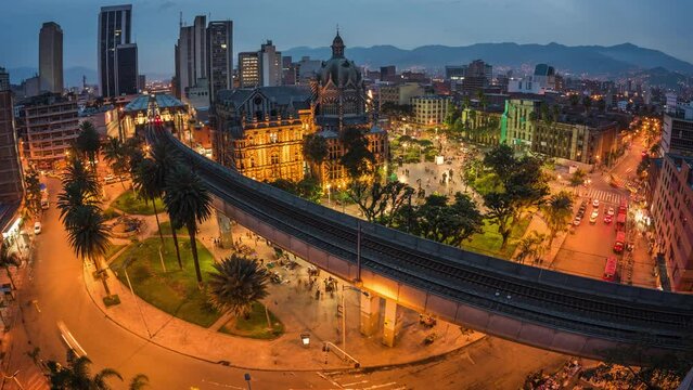 Dusk to night zoom out timelapse view of Plaza Botero square in Downtown Medellin, Antioquia Department, Colombia.  