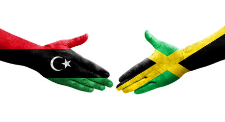 Handshake between Jamaica and Libya flags painted on hands, isolated transparent image.