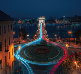Aerial view of traffic at Clark Adam Square roundabout with Szechenyi Chain Bridge and Danube river...