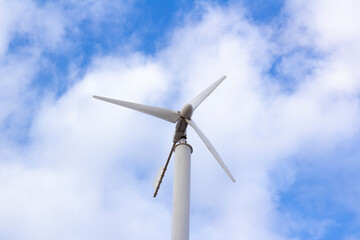 Fototapeta premium Photo of a fragment of a windmill against the sky in the Kazakh city of Pavlodar. Alternative energy sources. Green clean energy concept. Caring for nature in Kazakhstan. Copyspace