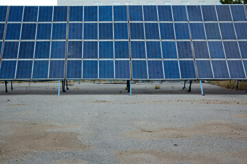 Frontal view of solar panels in Kazakh city of Pavlodar. Concept of ecological energy consumption....