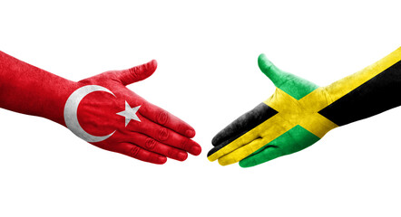 Handshake between Jamaica and Turkey flags painted on hands, isolated transparent image.