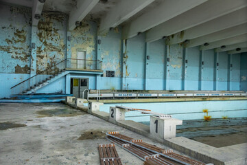 Derelict building indoors with abandoned swimming pool like Chernobyl, Bulgaria