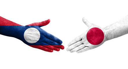 Handshake between Japan and Laos flags painted on hands, isolated transparent image.