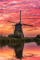 windmill under a blood red sky