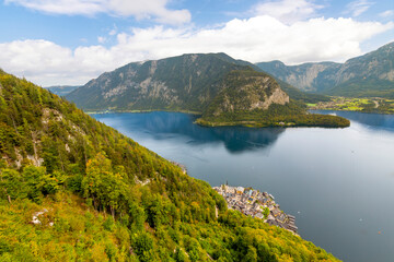 Fototapeta na wymiar View of the lake and village of Hallstatt, Austria, from the Welterbelick sky walk above the Alpine old town. 